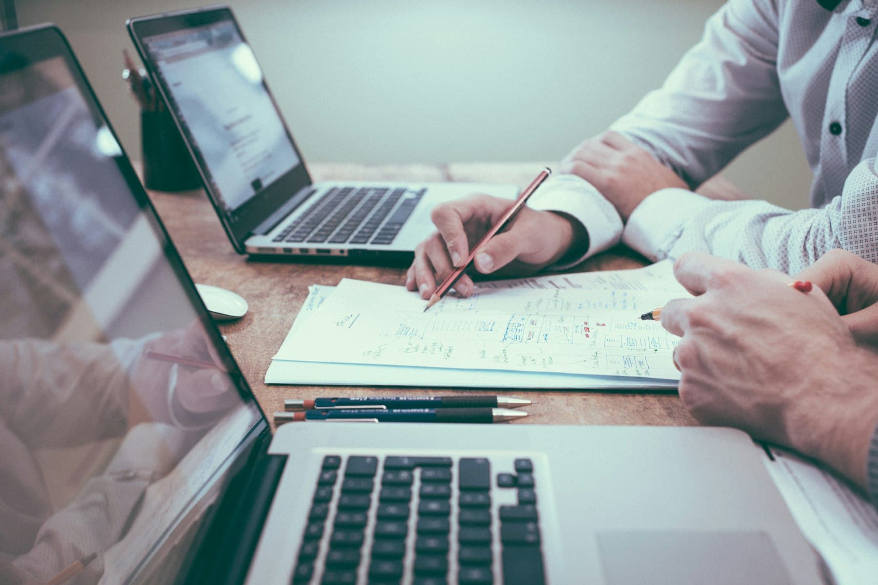 A product team reviewing amortization schedules before approval