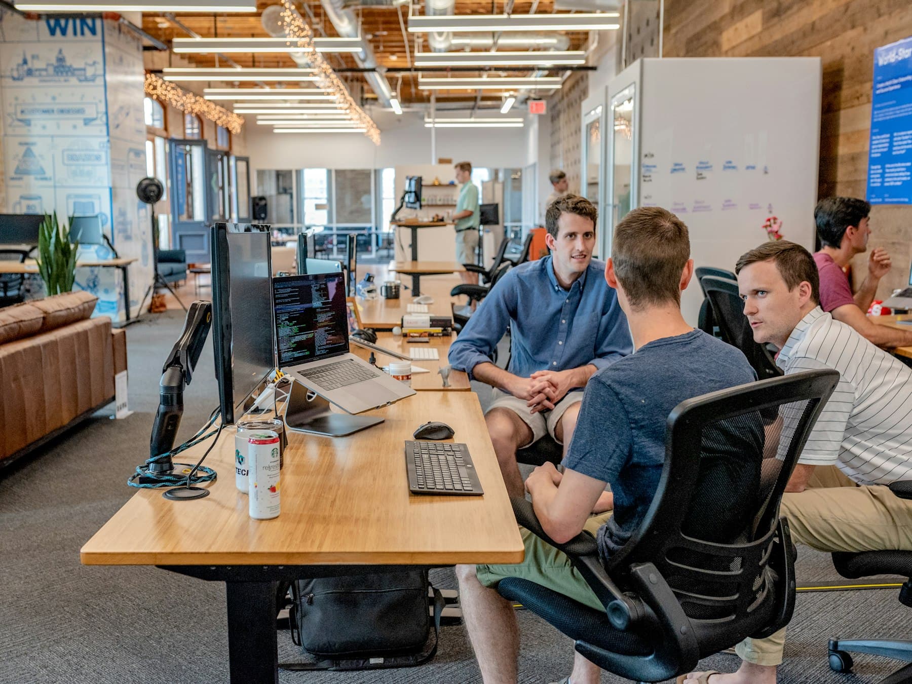 A team reviewing work together at a table